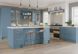 Modern kitchen with Allerforn Serica doors in Denim (blue), featuring an island and breakfast bar