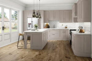 Modern kitchen with Trenton doors in Taupe (light brown / grey), featuring an island and breakfast bar