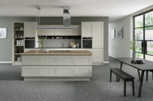 Modern kitchen with Serica doors in Dakar (light brown / grey), featuring an island