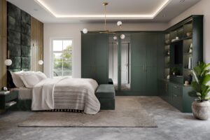 Built-in Harlem door Evergreen (dark green) wardrobe with multiple cabinets and shelves, with long gold handles